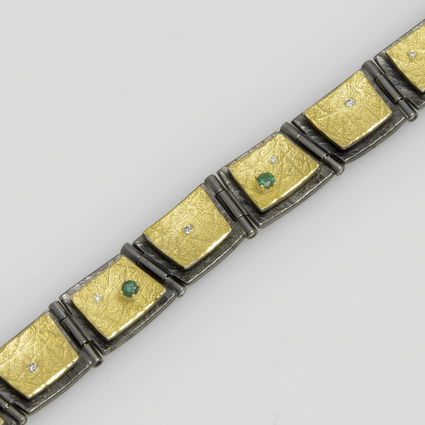 Modern bracelet in silver & gold with diamonds & tsavorites