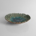 Dark green platter with perforated design