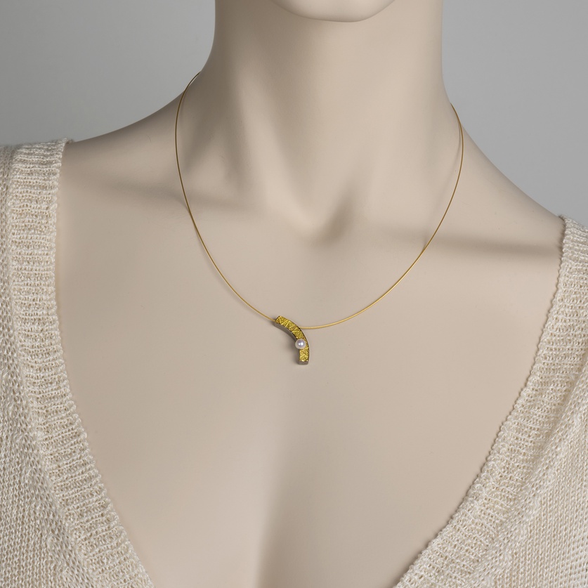 Curved silver & gold pendant with pearl and chain