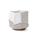 Low porcelain form with a platinum finish