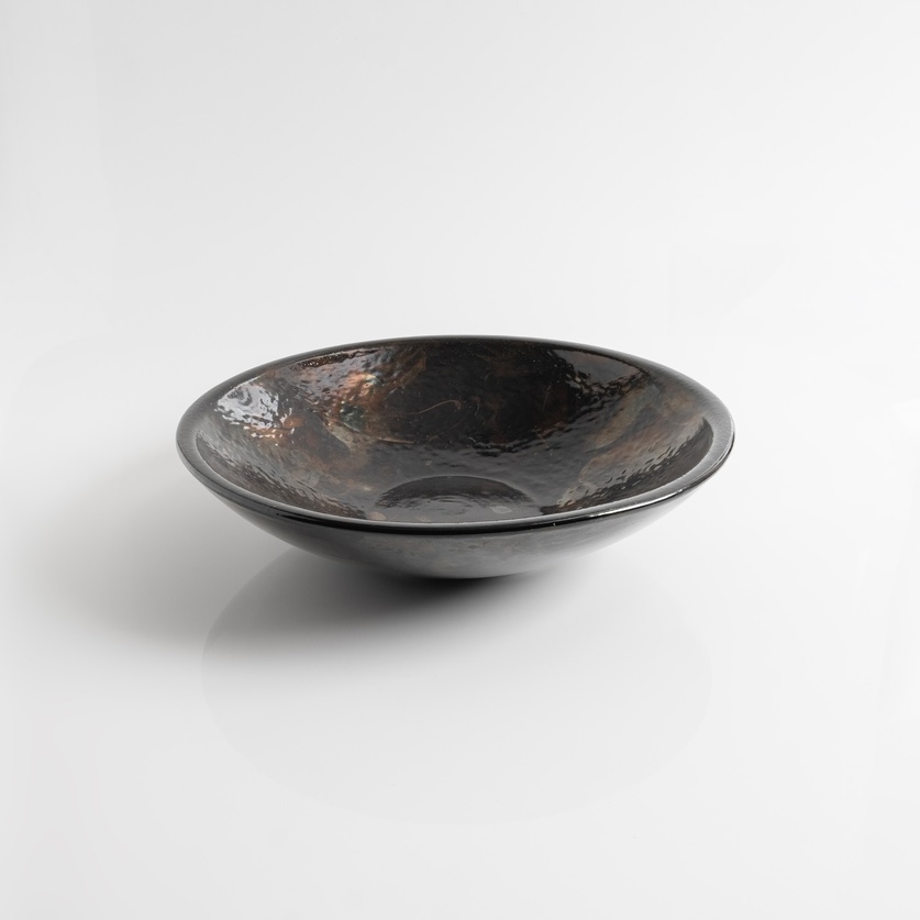 Black platter with iridescent surface
