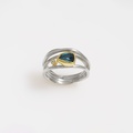 Ring with blue topaz and diamond in triple band