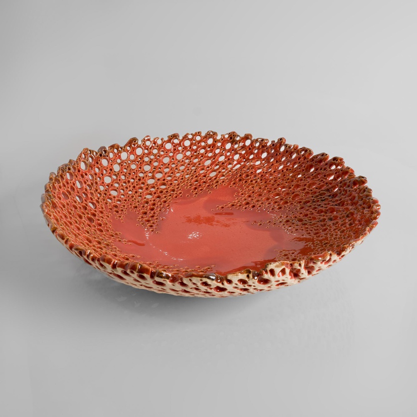 Red perforated ceramic platter