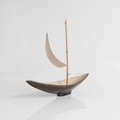 Ceramic sailboat of black colour