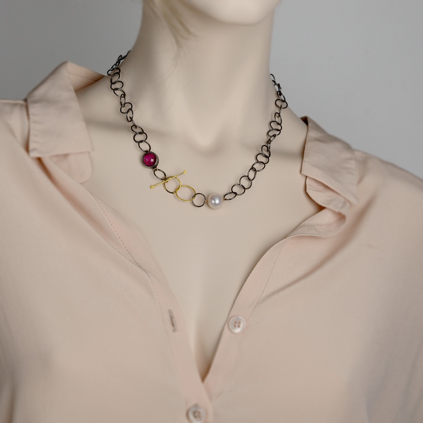 Black silver & gold necklace with ruby doublet stone and pearl