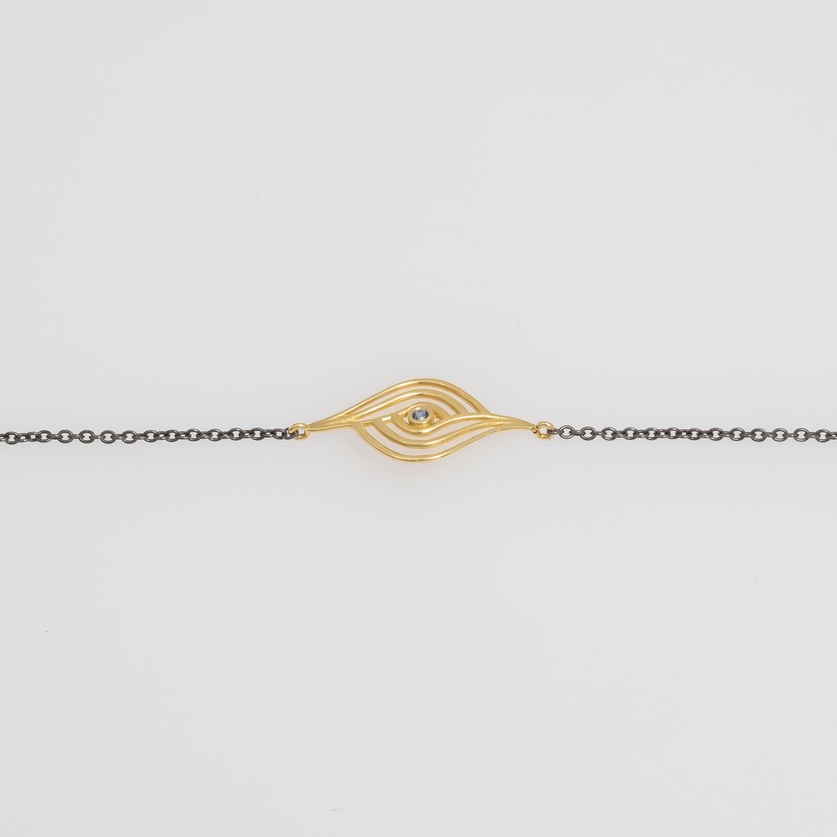 “Eye” bracelet in silver and gold with blue sapphire