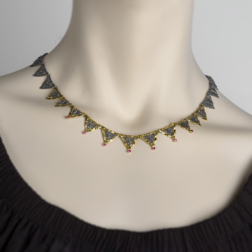 Stunning short silver necklace with gold inlay and rubies