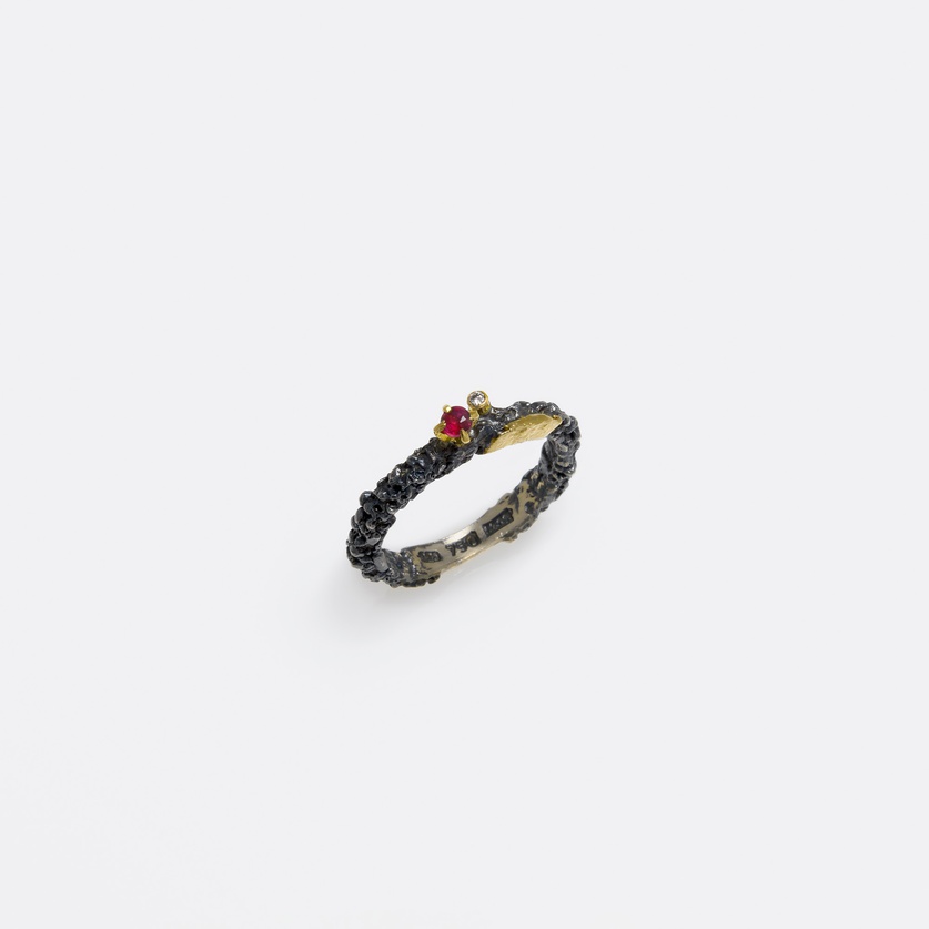 Sophisticated silver ring with gold inlay, ruby and diamond