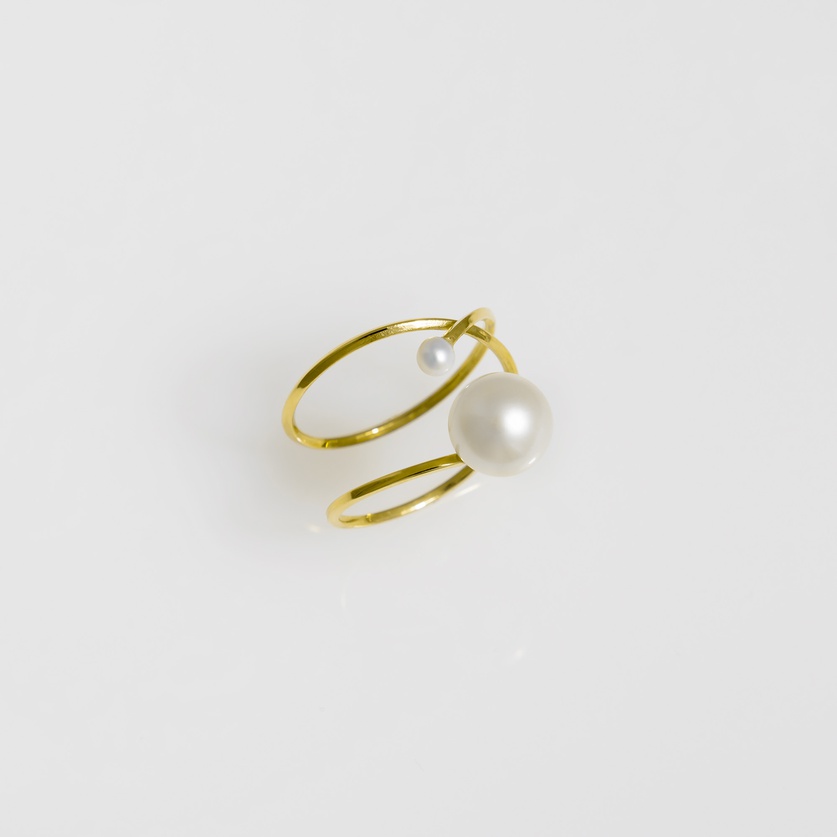 Gold ring of intricate detail with freshwater pearls