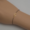 “Eye” bracelet in silver and gold with blue sapphire