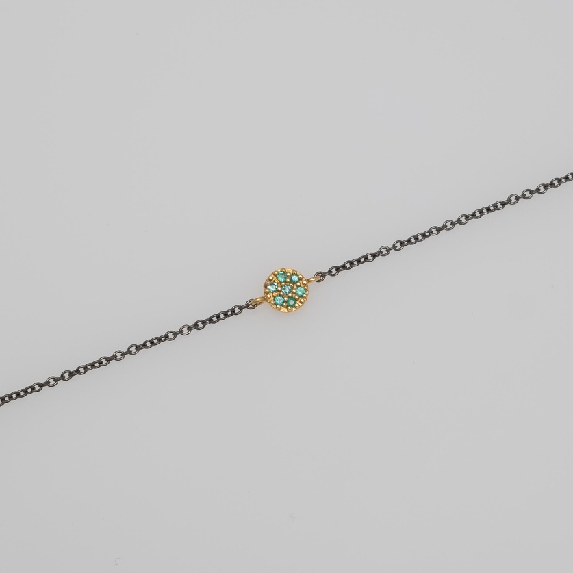 Bracelet in silver and gold with emeralds