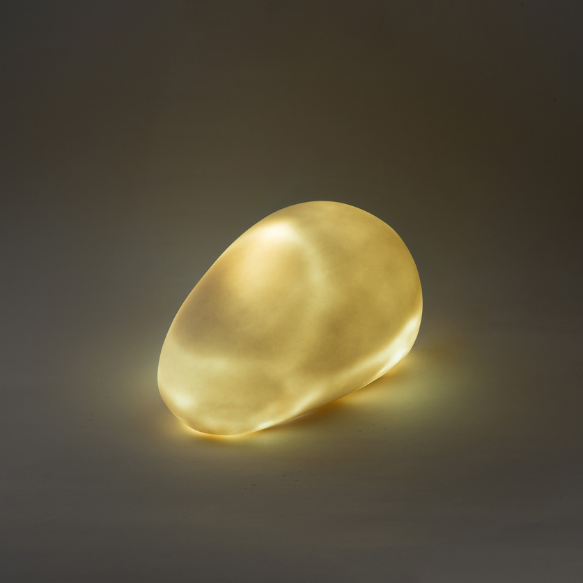 Minimal table light of pebble shape