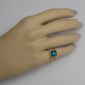 Gold ring with doublet stone apatite/quartz