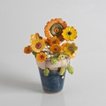 Ceramic flowers on a small pot