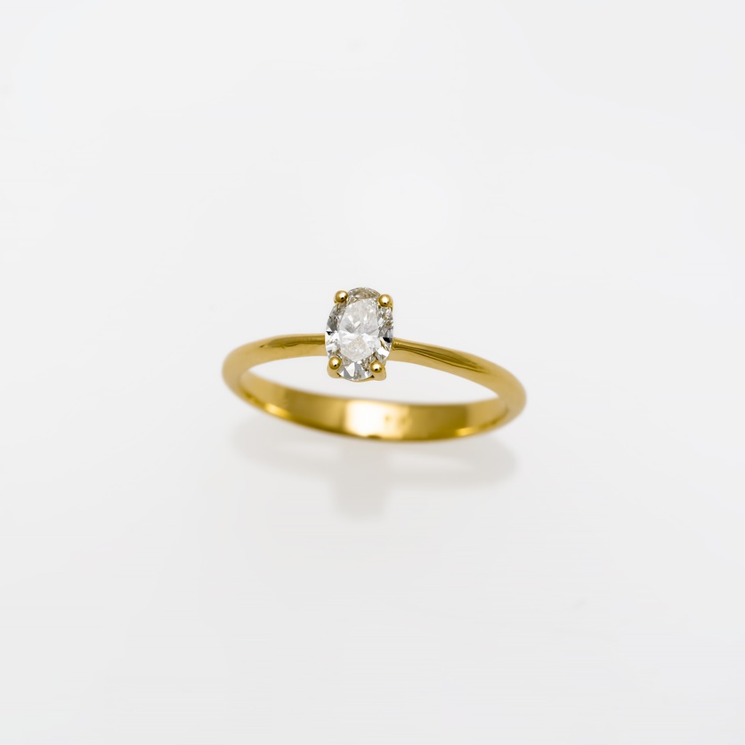 Gold Engagement Ring With Oval-Cut Diamond