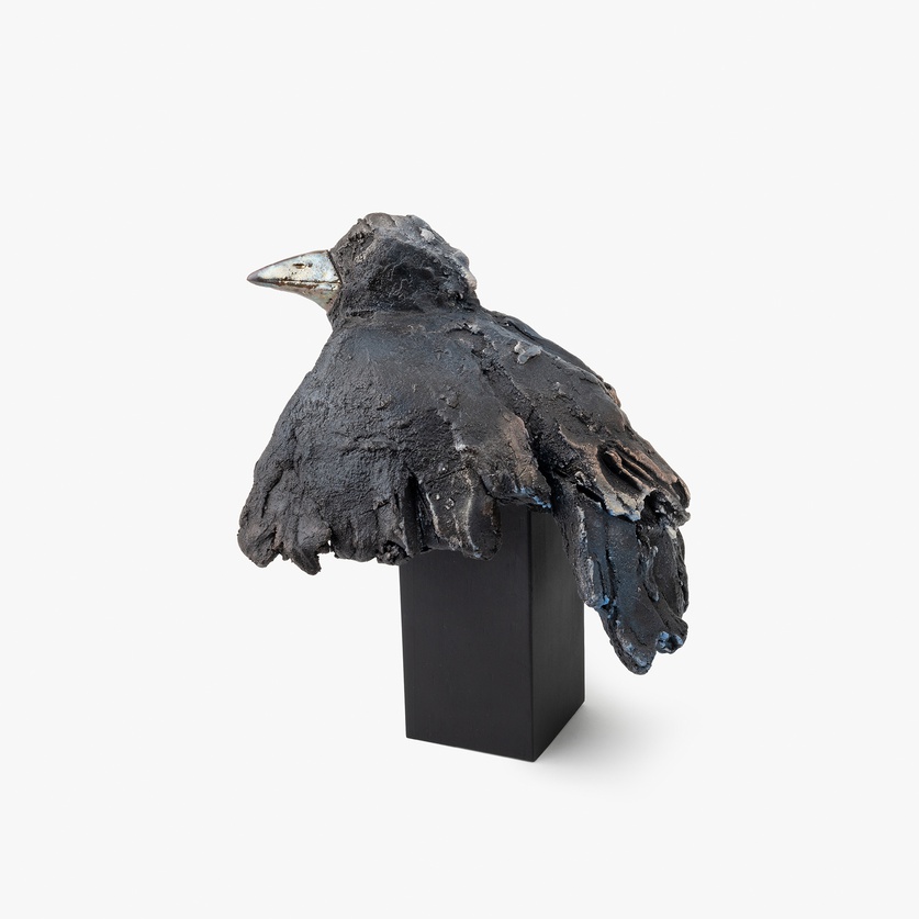 Excellent ceramic sculpture in a form of a crow with open wings
