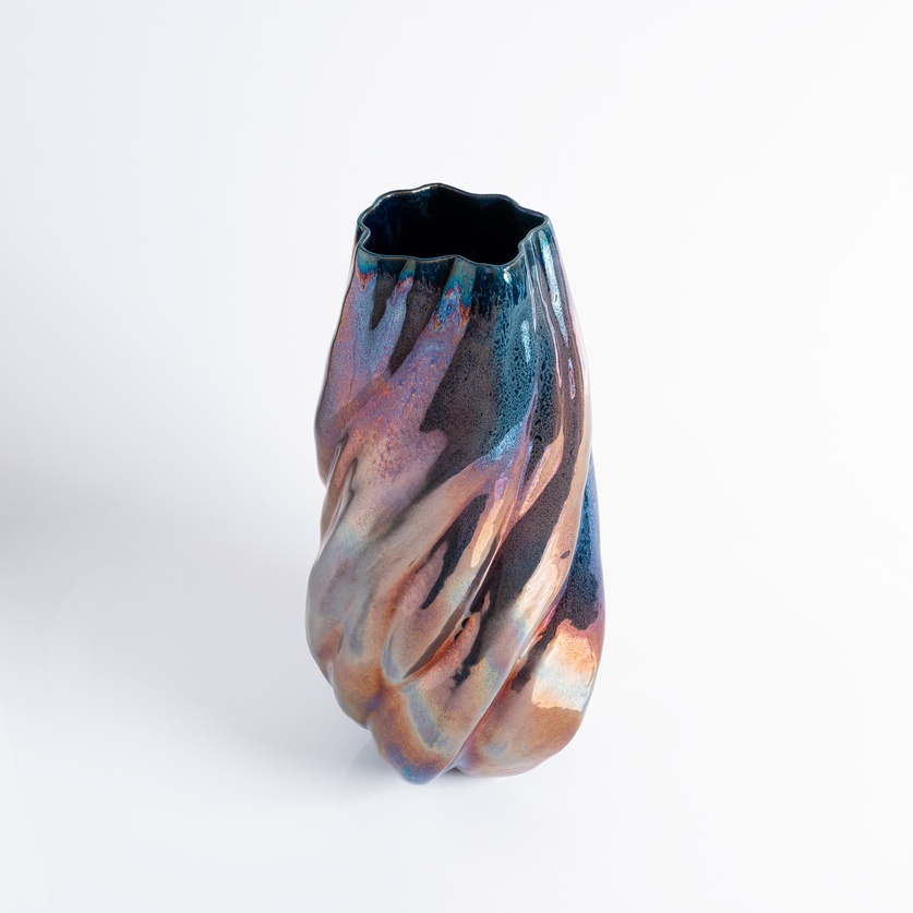 Captivating iridescent vase with striking curvature