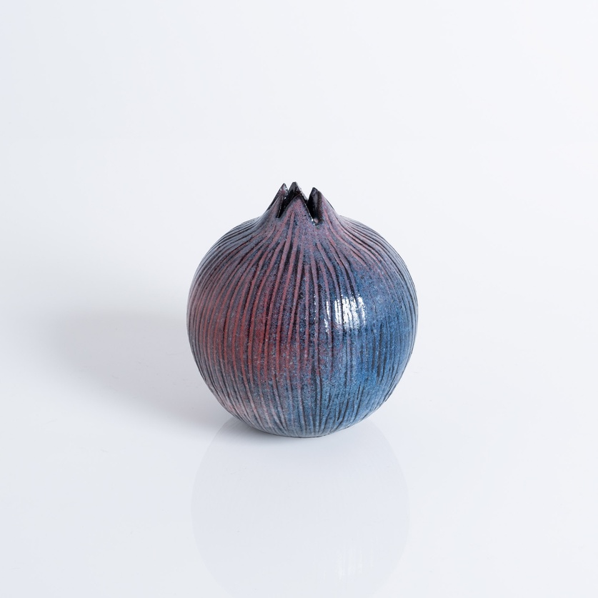 Engraved ceramic pomegranate