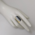 Silver ring in modern style with gold inlay